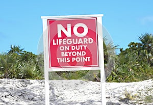 Sign warning that there is no lifeguard on duty