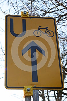 sign for bicycle, way around road works photo