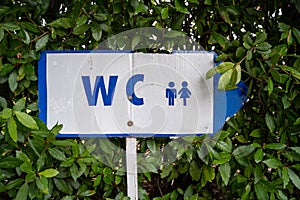 Sign for the WC watercloset, or toliet in blue and white, for men and women photo