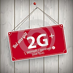 Sign Wooden Background 2G Plus photo