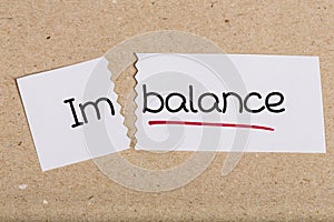 Sign with word imbalance turned into balance photo