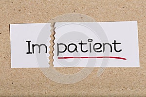 Sign with word impatient turned into patient photo