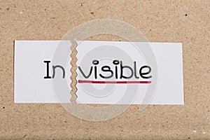 Sign with word invisible turned into visible