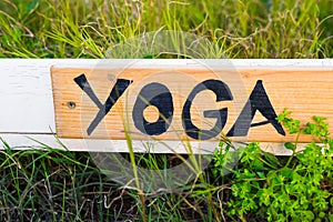 Sign with word yoga, signboard