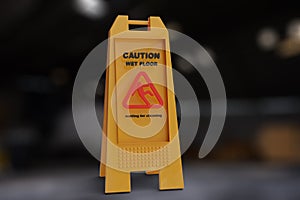 Sign yellow showing warning of caution wet floor wet floor sign on factory of falling person Caution wet floor Sign showing