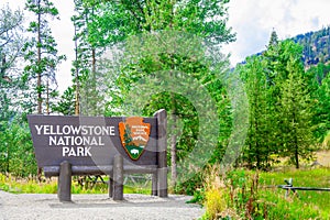 Sign Yellowstone National Park is located in the U.S. states of Wyoming, Montana, and Idaho. This park is the first national park