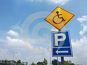 Signage for disabled parking. Established in a place reserved for the disabled.