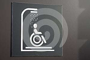 Signage indicating showers for disabled people