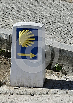 Signage indicating to pilgrims the direction to take to follow the road