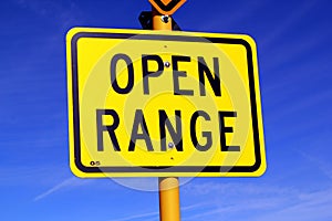 Signage next to the road in the high desert - Open range - cow - West of the USA