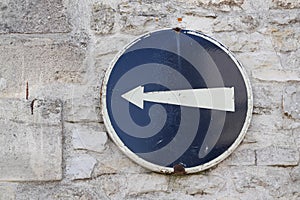 Signage old vintage road sign on street indicates car need to turn right