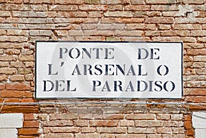 Signage Ponte de l`Arsenale o del Paradisoengl: area of the Arsenal or the paradise  area in Venice, Italy,  the shipyard area photo