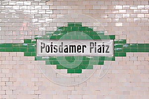 signage Potsdamer Platz - engl. Potsdam square - at the metro station in Berlin