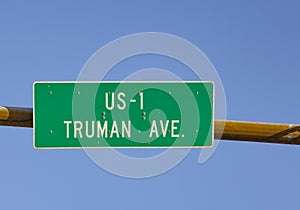 Signage US Highway No 1 called Truman Ave starting in Key West with traffic lights
