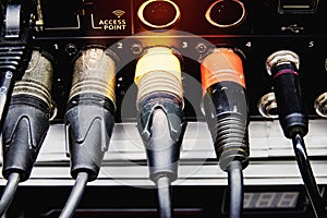 Signal cables on the back of the digital audio mixer