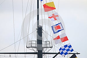 Signal flags and ship mast