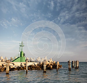 Signal light and breakwaters at the harbor