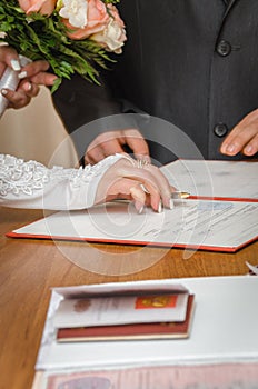 Signature of the bride in a wedding book