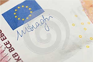 Signature of Mario Draghi, the new italian prime minister on a ten euro banknote photo