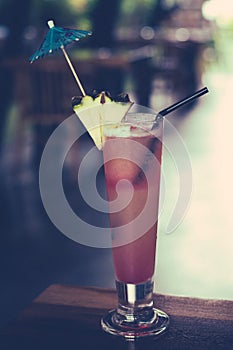 Signature Sling, Gin, Cherry Brandy, Pineapple Juice, Grenadine Syrup, Angostura bitters, soda