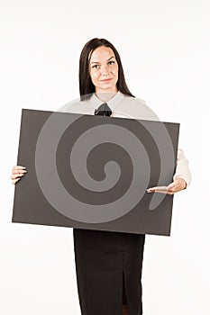 Signboard. Business woman with a big black card. on a white back