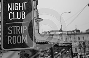 Signboard of a night club with striptease