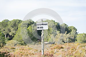 Signboard private hunting ground spanish words photo