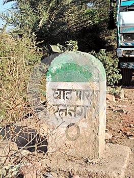 Signboard on the road showing start of the uphill climb of hill of Ratangarh Kheri in Madhya Pradesh, India photo