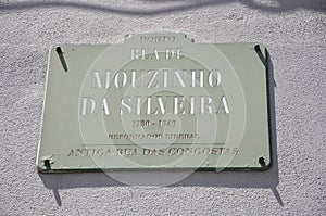Signboard of Rua de Mouzinho da Silveira Street in Downtown of Porto in Portugal photo