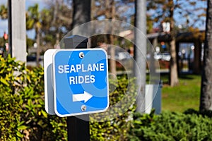 Signboard for SEAPLANE RIDES showing right, Tavares, Florida, USA photo