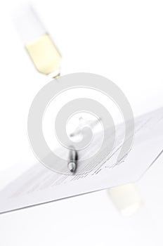 Signed contract and a glass of champagne