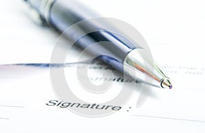 Signing a contract.