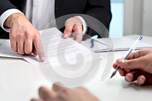 Signing a contract or agreement. photo