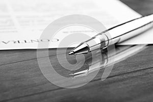 Signing a contract, business contract details. Black and white f