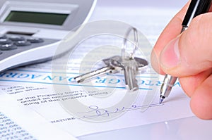 Signing the mortgage contract to delivery of keys with calculator