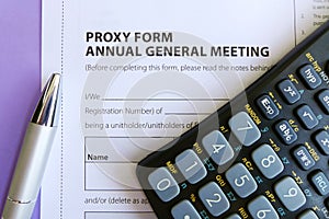 Signing Proxy Form at AGM