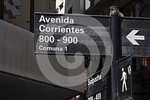 Signpost arrows with street names in the Buenos Aires city, Argentina