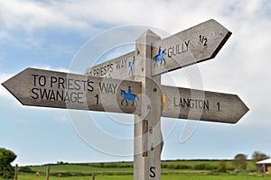 Signpost on coastal path near Durlston