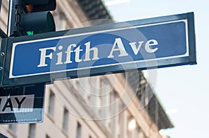 Signpost with Fif th Avenue in New York