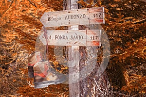 A signpost showing the direction to the refuge Fonda Savio and Auronzo in Itlay photo