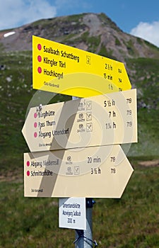 Signpost of hiking trails in the Alps