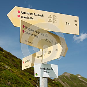 Signpost of hiking trails in the Alps