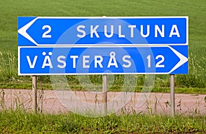 Signpost for Skultuna and Vasteras