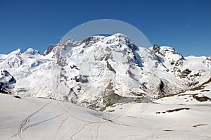 Signpost on snow-covered path