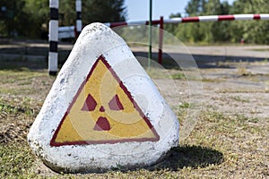 Signpost warning of radioactivity