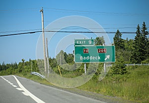 Signposts for Baddeck Cape Breton Highlands Parks Canada along the Trans Canada Highway NS105
