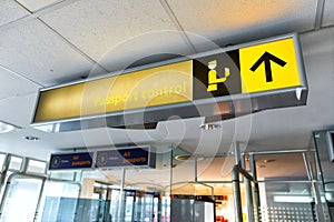 Signs for the border control at an international airport terminal