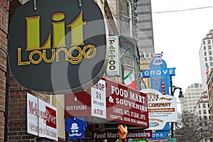 Signs for businesses along historic 6th Street in downtown Austin, Texas