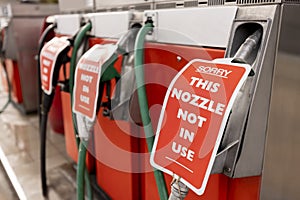 Signs On Closed Gas Station Pumps During Fuel Shortage