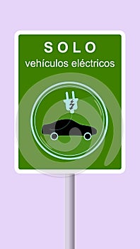 Signs collectively. Only allowed for electric vehicles, text in Spanish. Public displays. Traffic signal graph.